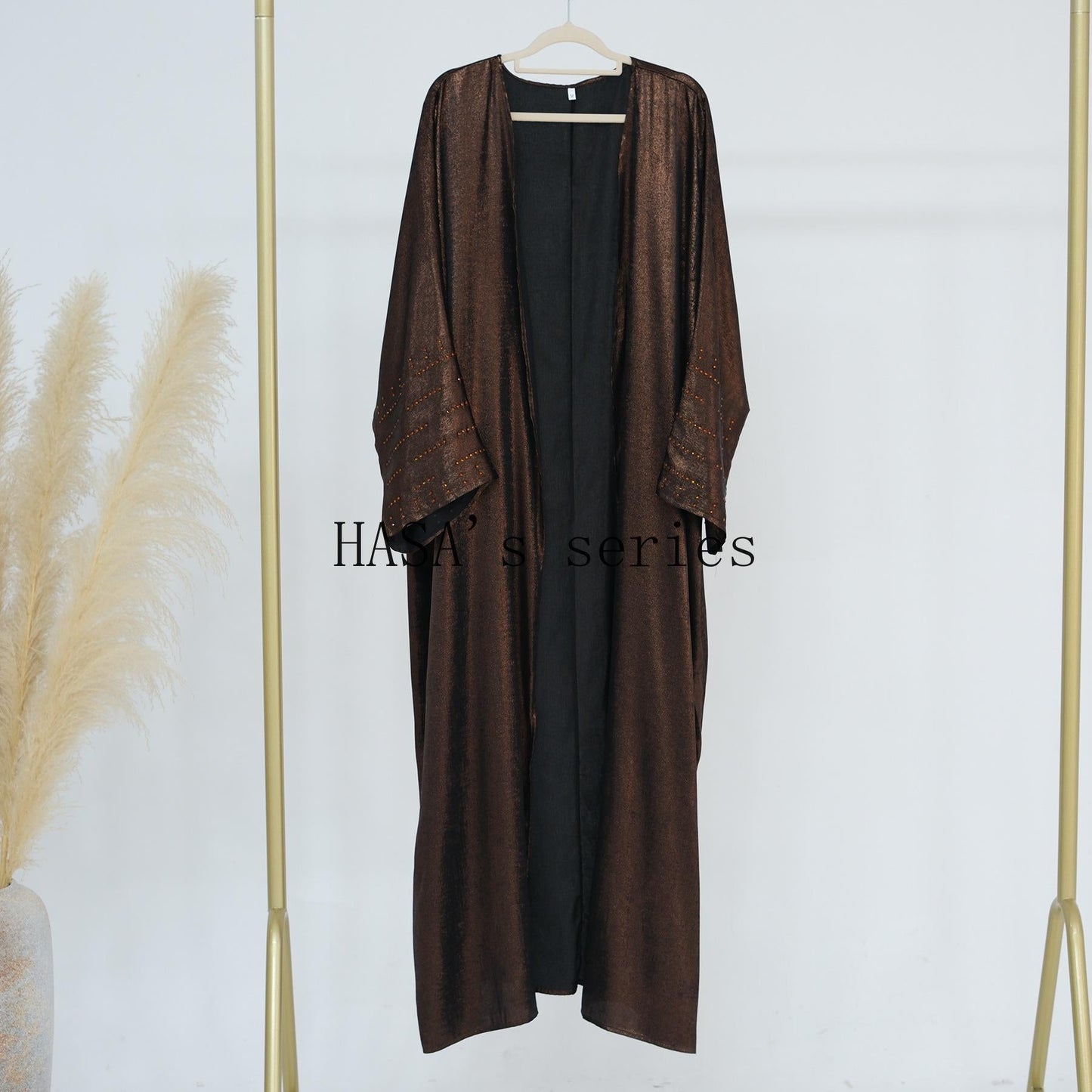 HS4844 A loose, long, robe-style dress made of velvet material, an elegant and sophisticated design with a refined texture.