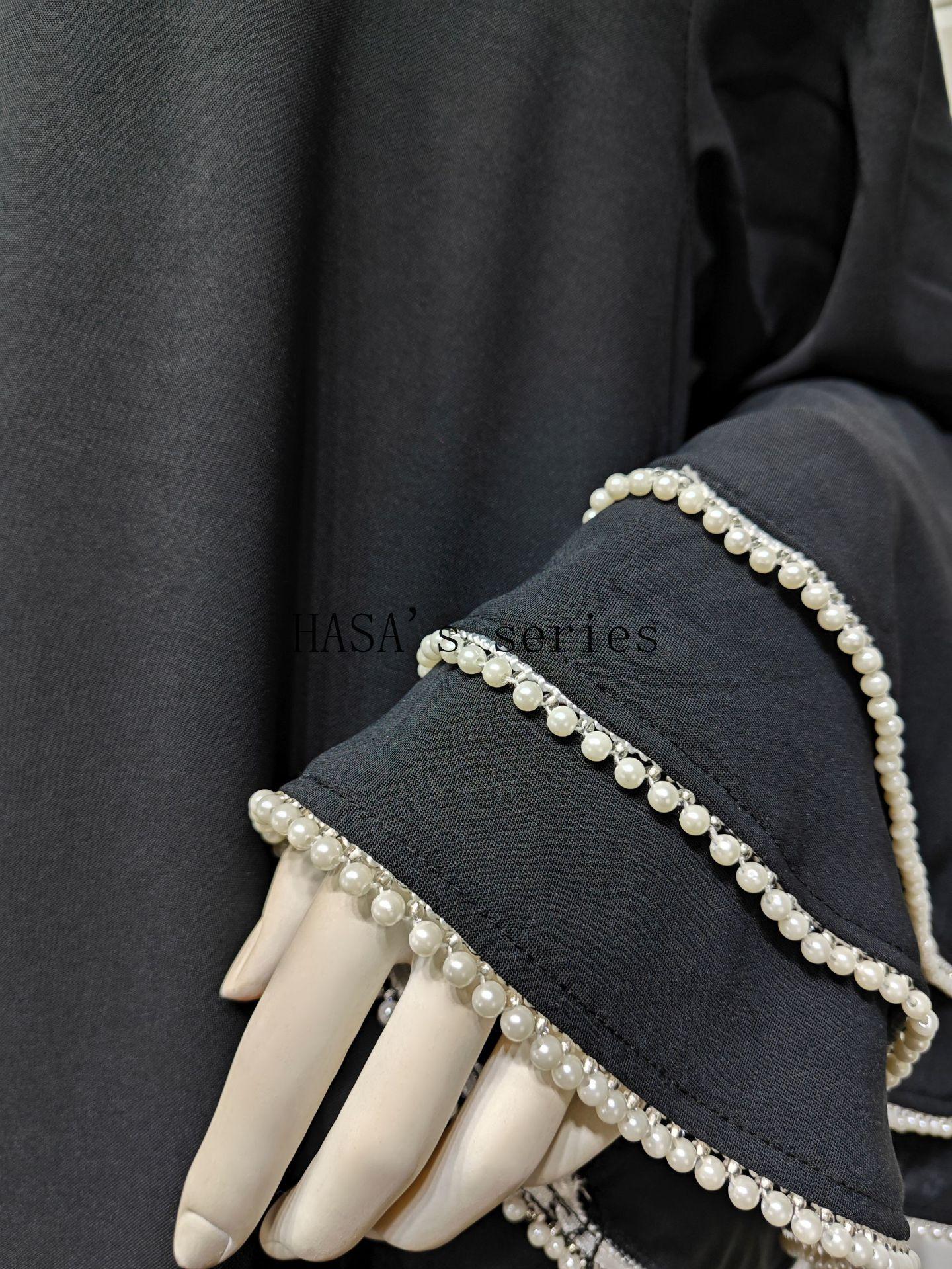 HS5093 Elegant black cardigan-style long robe with wide sleeves and a round-neck dress design featuring beaded embellishments.