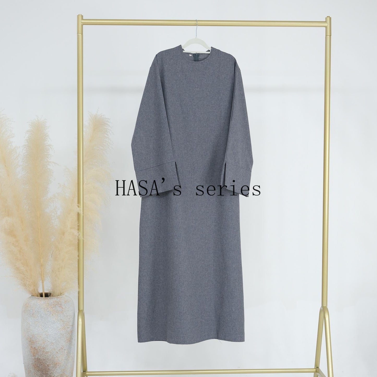 HS4855 A Solid-colored, Loose-fitting Maxi Dress, Offering Both Comfort and Elegant Style.