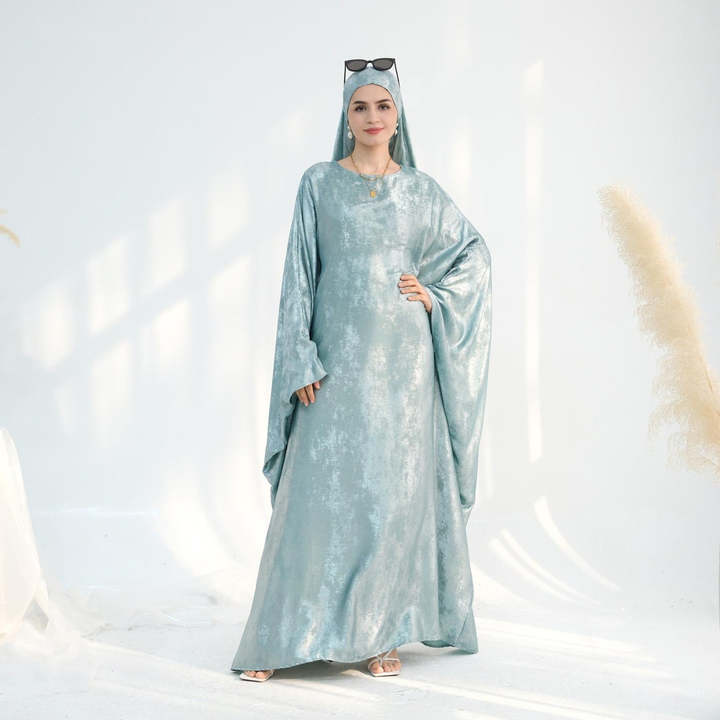 HA5878 A Glossy Dress That Combines Softness and Fluidity