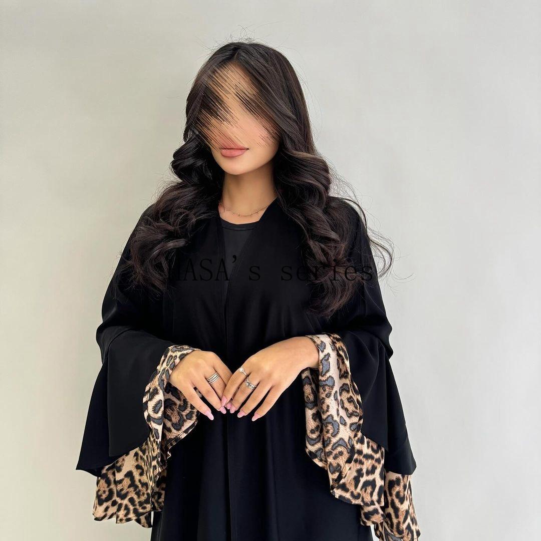 HS5103 A black robe with leopard print details, a simple and elegant cardigan-style dress.