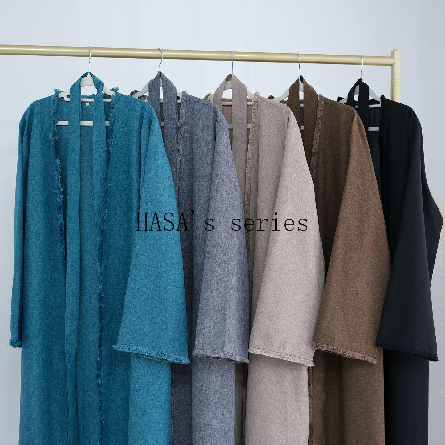 HS5147 Elegant Long Cardigan Robe with Flowing Tassels, A Loose-fitting, Coat-style Dress.