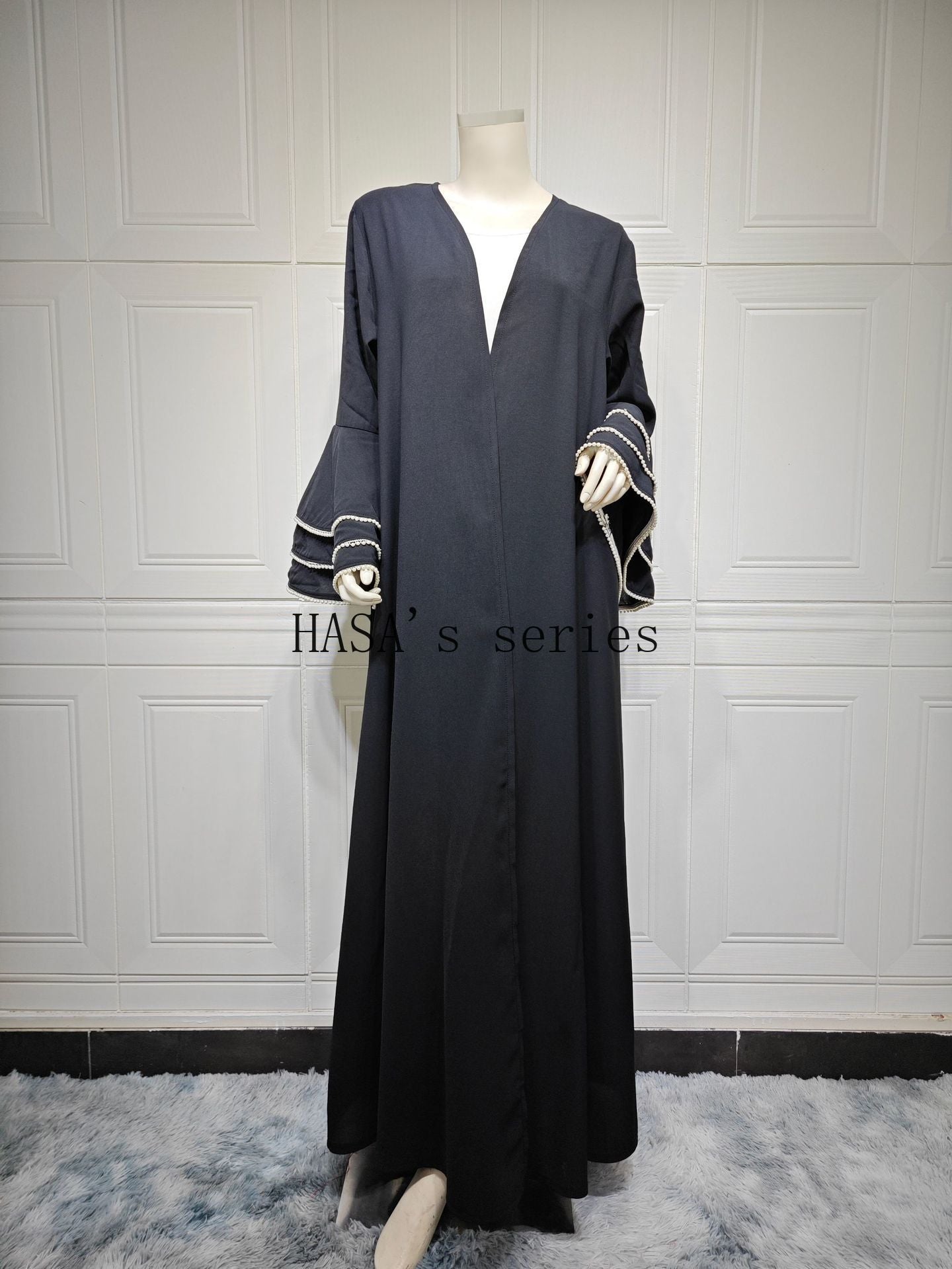 HS5093 Elegant black cardigan-style long robe with wide sleeves and a round-neck dress design featuring beaded embellishments.