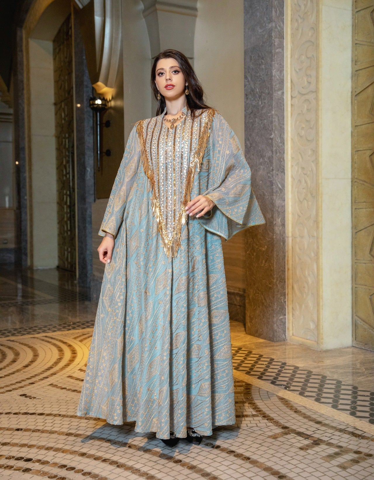 HA6648 A long robe with mesh sequins and embroidered details; an elegant and sophisticated dress.