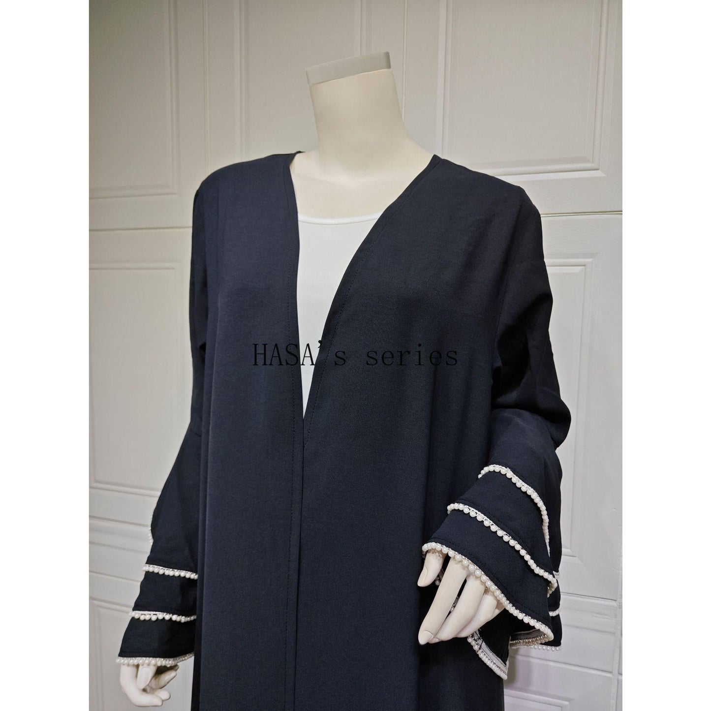 HS5093 Elegant black cardigan-style long robe with wide sleeves and a round-neck dress design featuring beaded embellishments.