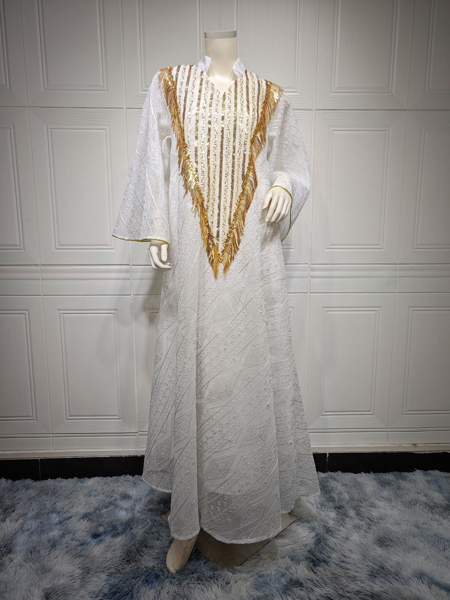 HA6648 A long robe with mesh sequins and embroidered details; an elegant and sophisticated dress.