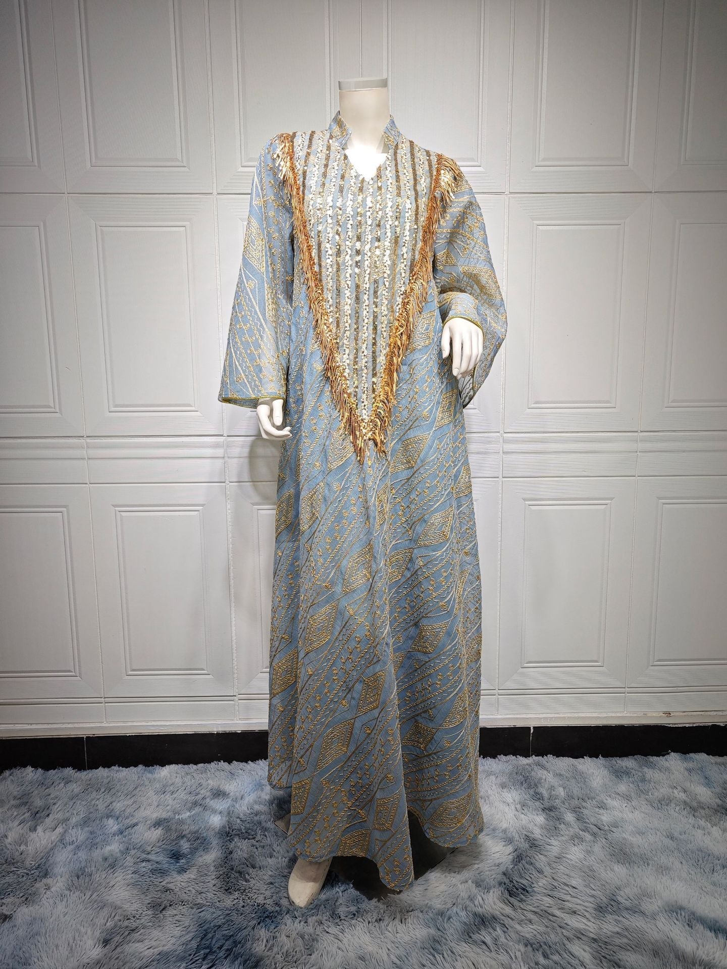 HA6648 A long robe with mesh sequins and embroidered details; an elegant and sophisticated dress.