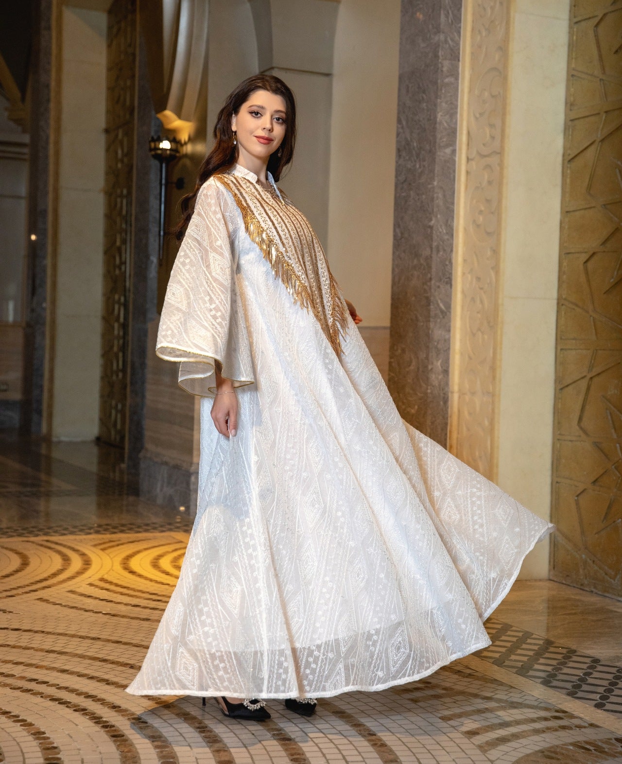 HA6648 A long robe with mesh sequins and embroidered details; an elegant and sophisticated dress.