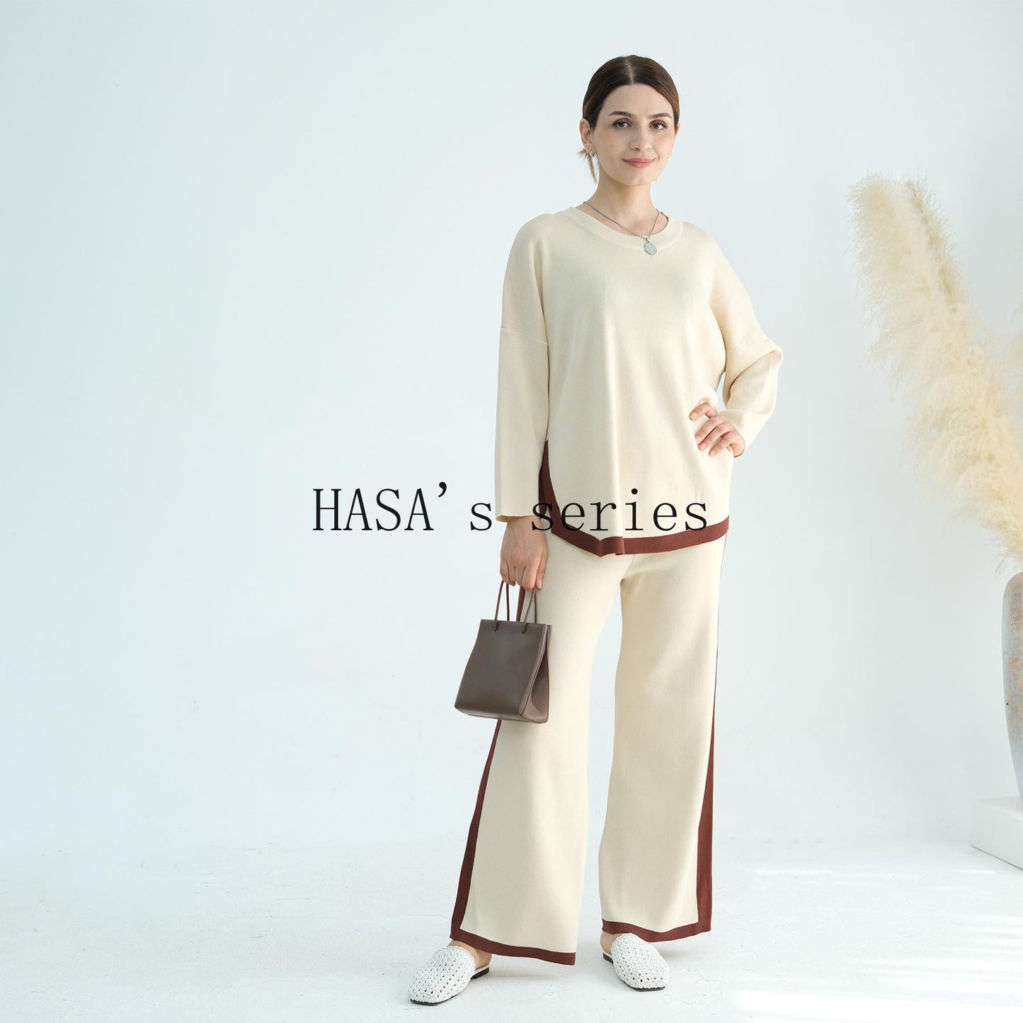 HS5149 Simple and elegant knitted set, featuring a loose-fitting, thick, long-sleeved two-piece design.