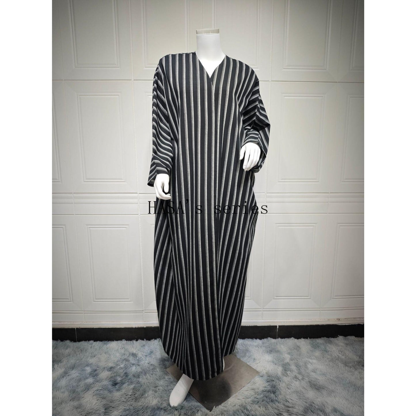 HS5096 Stylish Black and White Striped Long Coat with A Loose-fitting, Open-front Design.