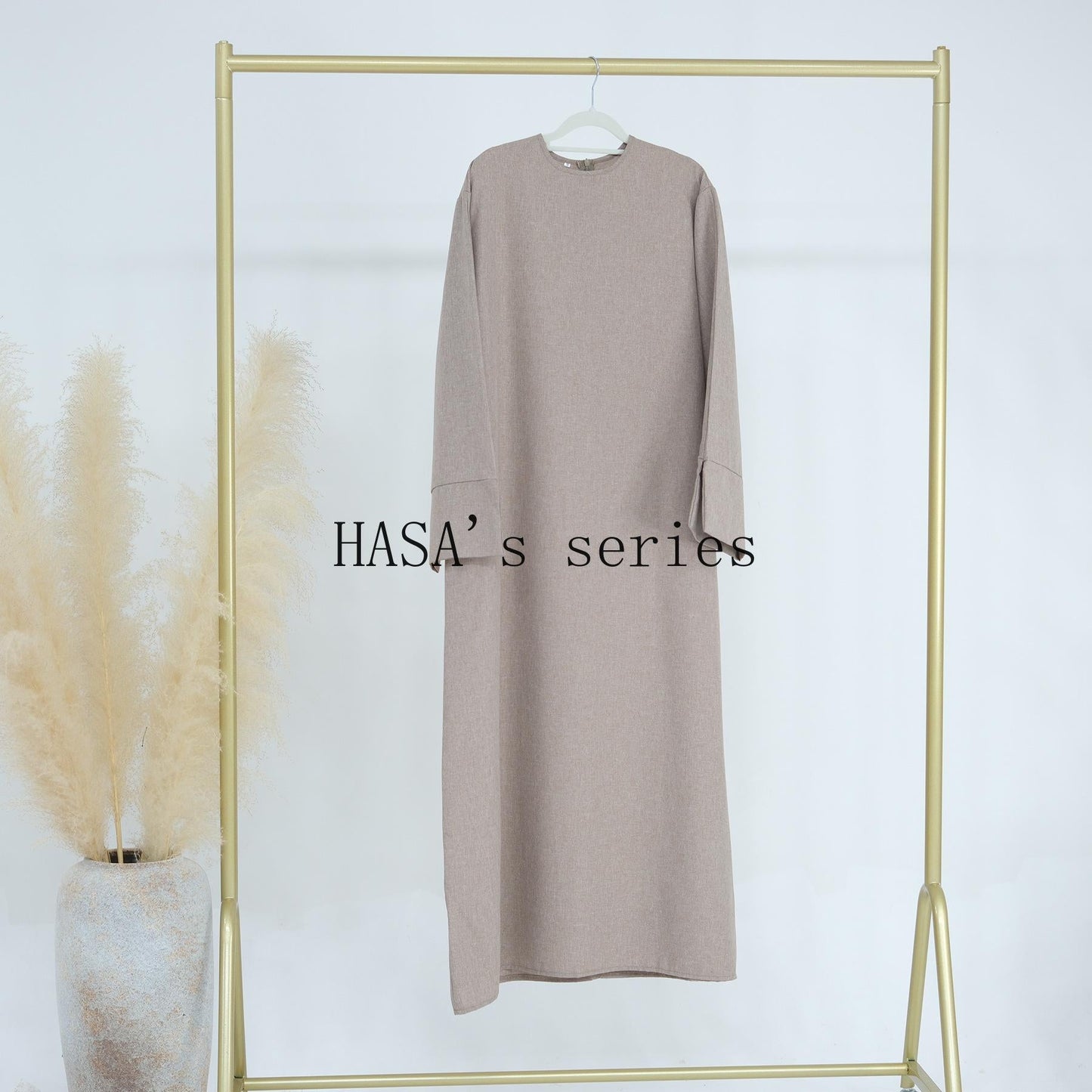 HS4855 A Solid-colored, Loose-fitting Maxi Dress, Offering Both Comfort and Elegant Style.