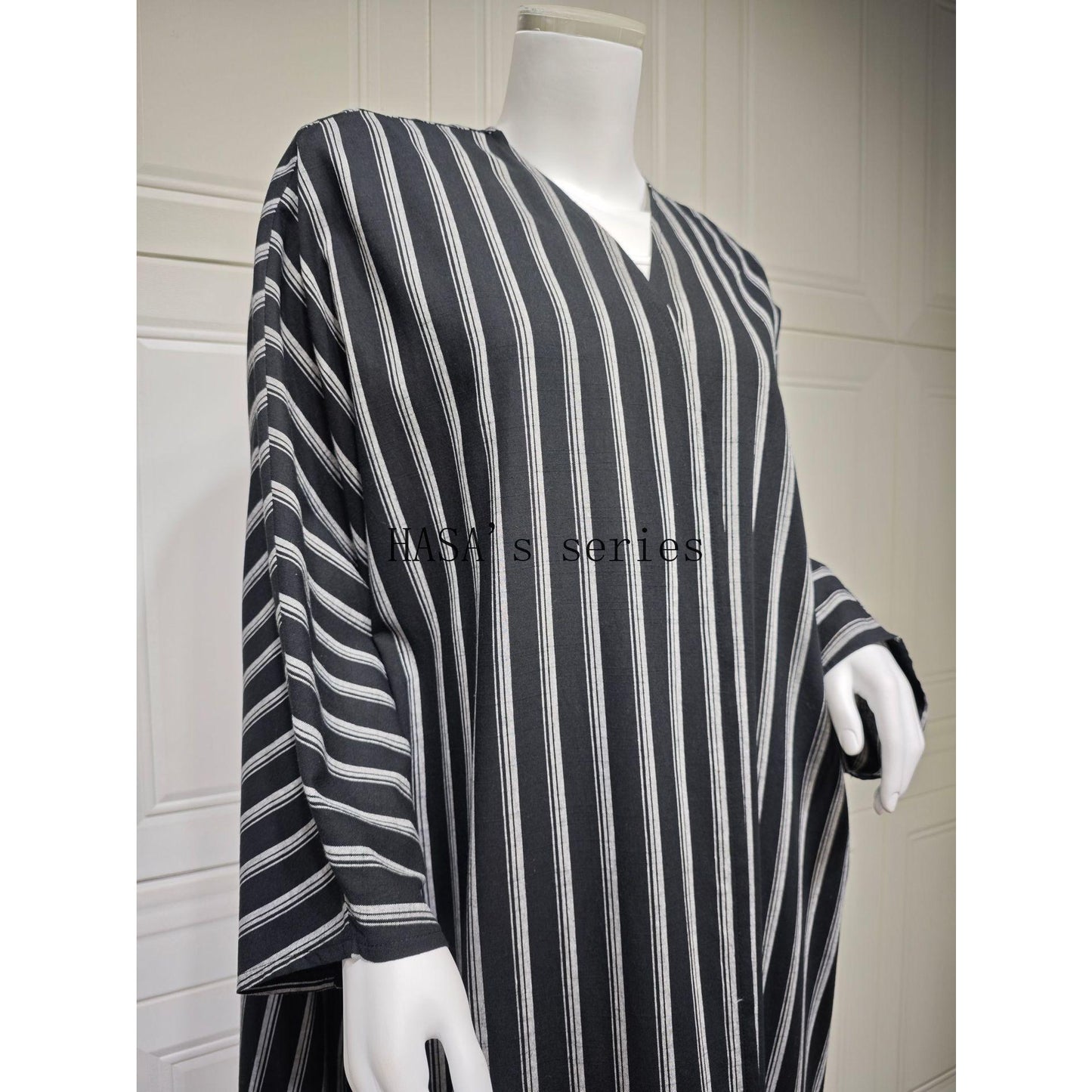 HS5096 Stylish Black and White Striped Long Coat with A Loose-fitting, Open-front Design.