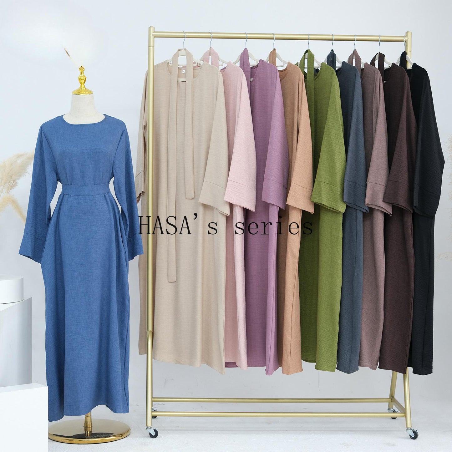 HS4848 A simple, waist-cinching spring/summer dress with a relaxed, long design.