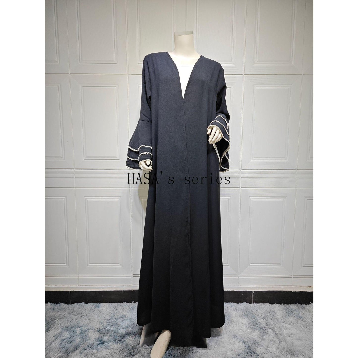 HS5093 Elegant black cardigan-style long robe with wide sleeves and a round-neck dress design featuring beaded embellishments.