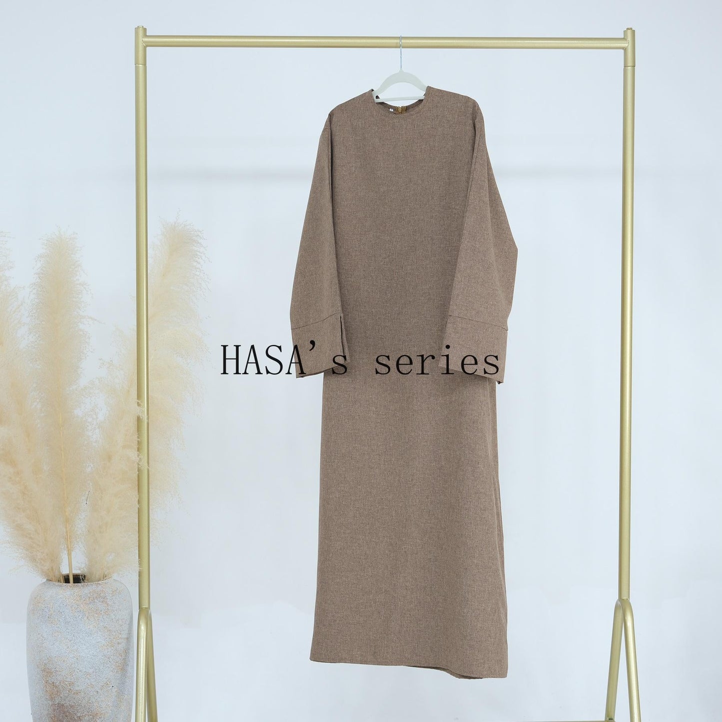 HS4855 A Solid-colored, Loose-fitting Maxi Dress, Offering Both Comfort and Elegant Style.