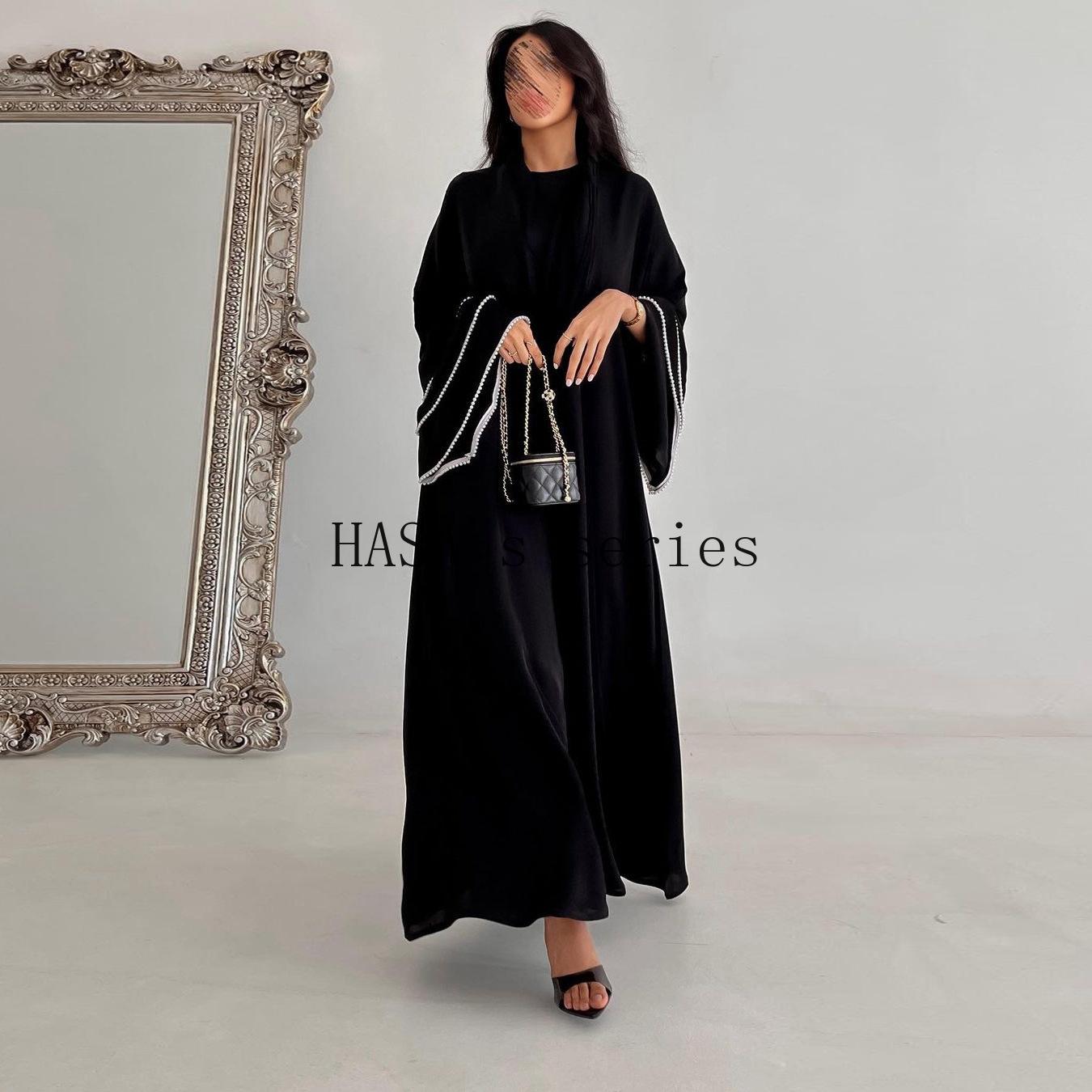 HS5093 Elegant black cardigan-style long robe with wide sleeves and a round-neck dress design featuring beaded embellishments.