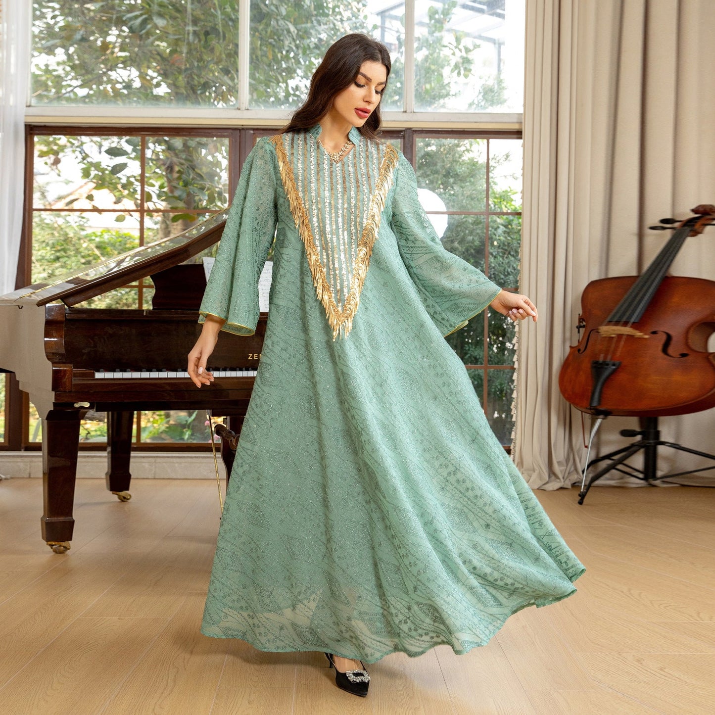 HA6648 A long robe with mesh sequins and embroidered details; an elegant and sophisticated dress.
