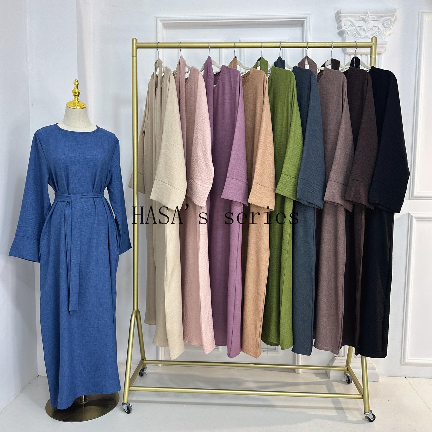 HS4848 A simple, waist-cinching spring/summer dress with a relaxed, long design.