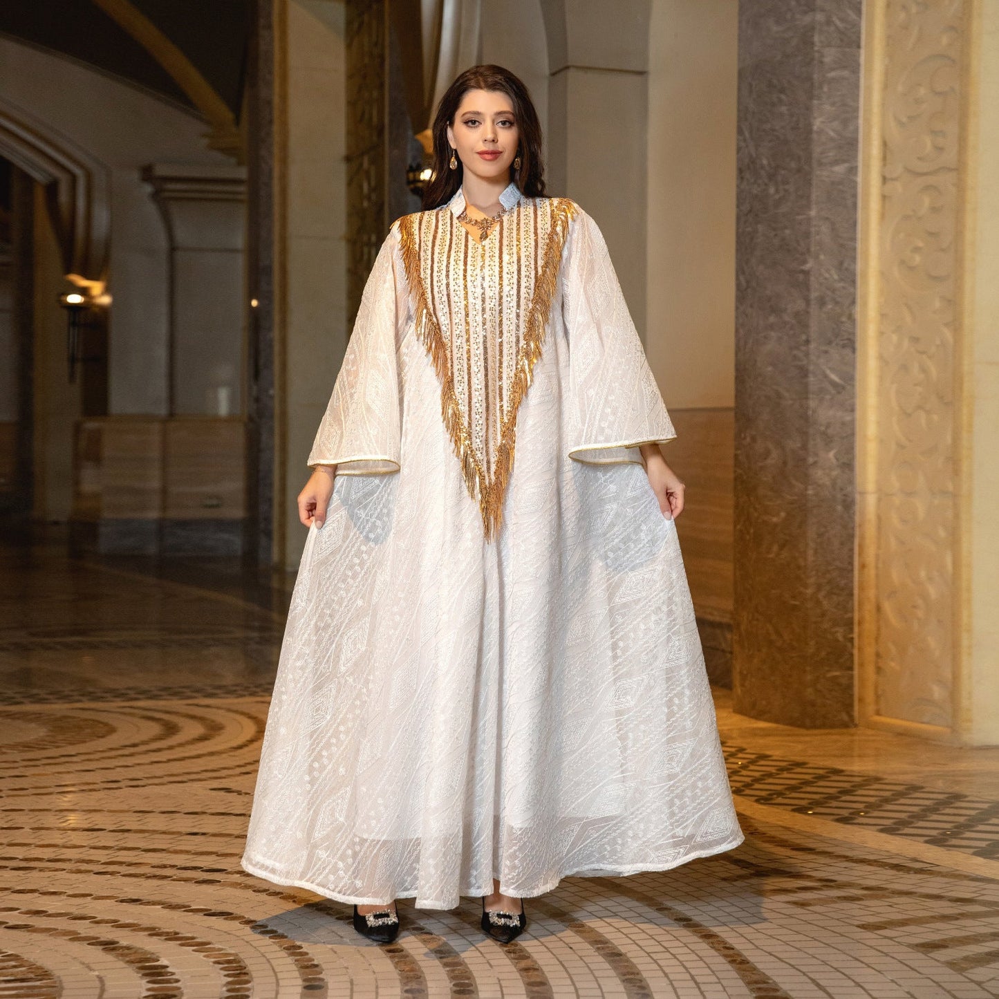 HA6648 A long robe with mesh sequins and embroidered details; an elegant and sophisticated dress.